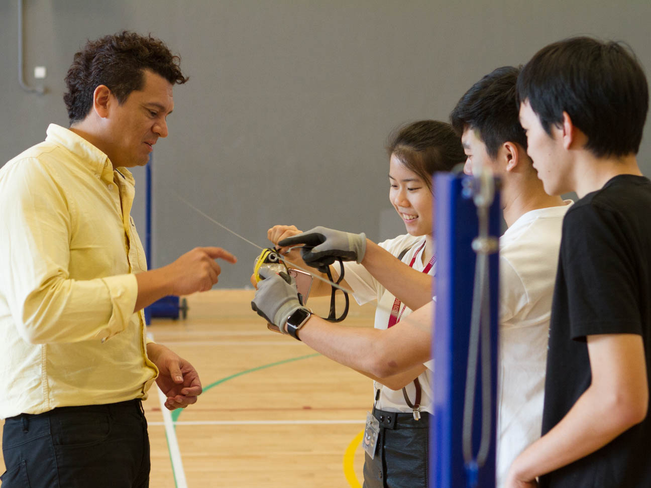 Faculty Franklin Anariba with a group of students