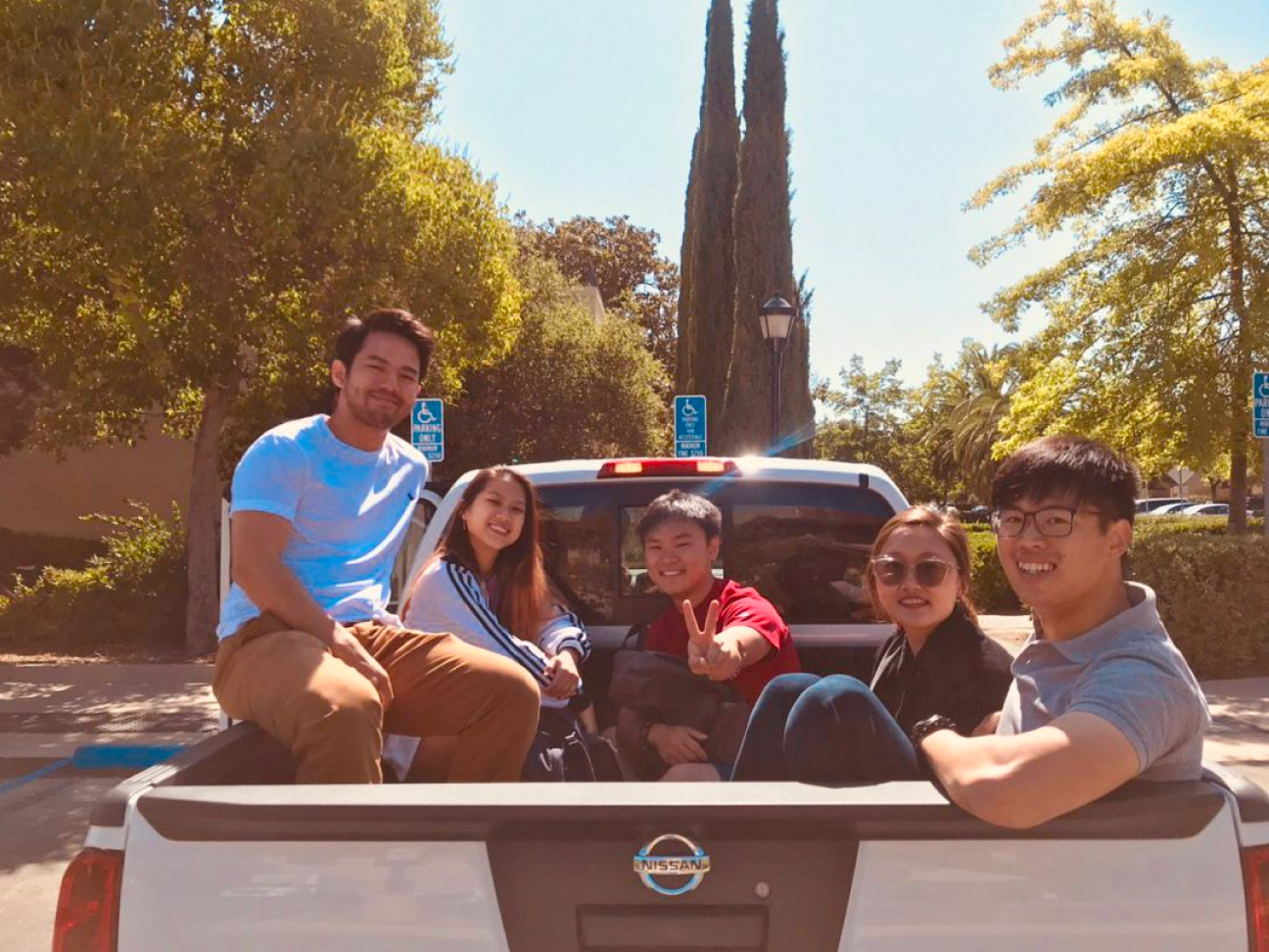 Students sitting in a truck