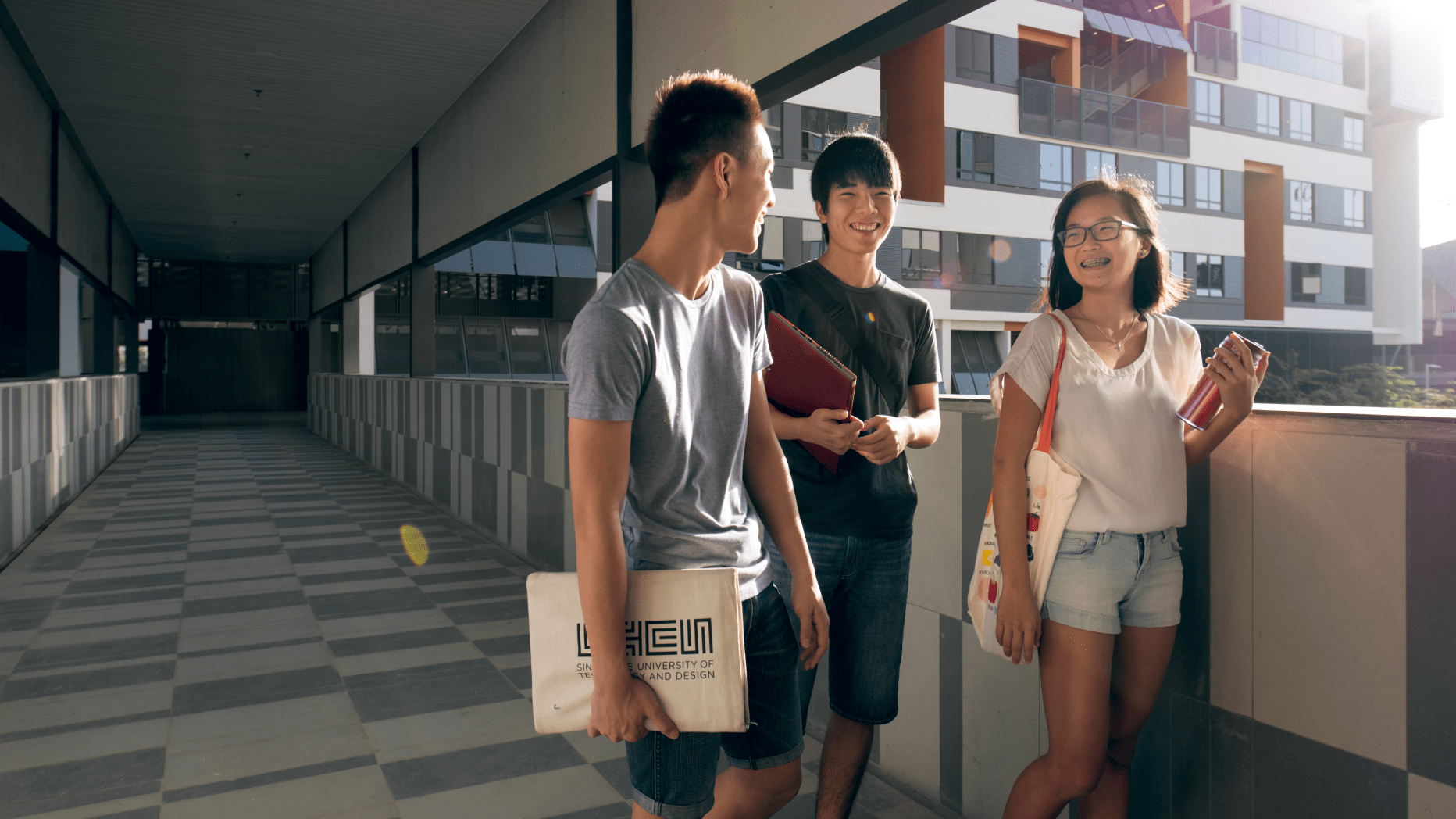 Freshmore students walking through SUTD housing